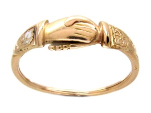 Georgian (18th century) wedding rings were popular from Roman times right up to the Victorian age, and were known as Fede Gimmal or Gimmel rings. 2 or 3 hoops would fit together like a puzzle, with 2 clasping hands.